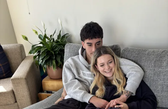 Two people on couch
